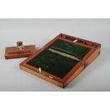 A 19th century figured mahogany and brass inlaid writing box with part fitted interior, 14" wide,