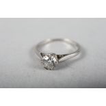 A platinum diamond solitaire ring, diamond approximately half carat