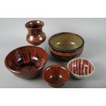 M W: a studio pottery bowl with resist glazed decoration, 11" dia, a deeper similar bowl, 10" dia, a