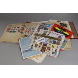 A loose leaf stamp album, a collection of first day covers, Royal visit to South Africa 1947, and