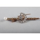 A yellow metal, diamond and pearl set star and crescent moon bar brooch