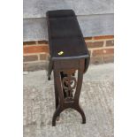 A mahogany gate leg table with pierced sides, 21" wide, and an oak drop leaf table, on turned and
