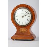 An Edwardian mahogany and inlaid balloon mantel clock, supplied by Harrods, 7 1/2" high