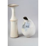 L P: a cream glazed studio waisted vase with flared rim, 17" high, an oviform vase with offset mouth