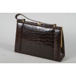 A 1950s crocodile handbag