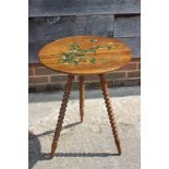 A late 19th century painted olive wood circular top occasional table, inscribed "San Remo", on
