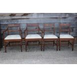 A set of four 19th century mahogany bar back dining chairs with drop-in seats, on turned and