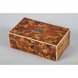 A 19th century tortoiseshell and ivory line inlaid jewellery box, 7 1/4" wide