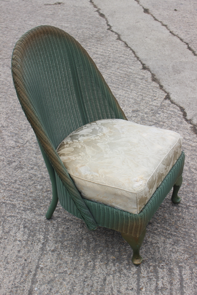 A green and gold painted Lloyd Loom nursing chair with floral upholstered seat, on cabriole supports - Image 5 of 5