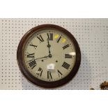 A grained as mahogany cased circular wall clock with white enamel dial and striking movement by
