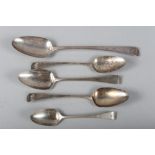 A Georgian silver basting spoon, three tablespoons and a similar dessert spoon, 9.3oz troy approx