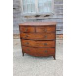A mahogany bowfront chest of two short and three long graduated drawers, on splay supports, 42" wide