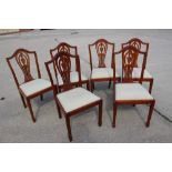 A set of six Hepplewhite design standard dining chairs with drop-in seats