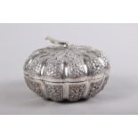 A South American? white metal circular-shaped pot and cover with engraved decoration, 3 1/4" high