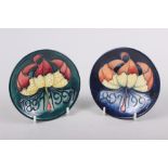 A Moorcroft "Tiger Lily" pattern circular pin dish, by Ailie Woodhead, 4 1/2" dia, and another