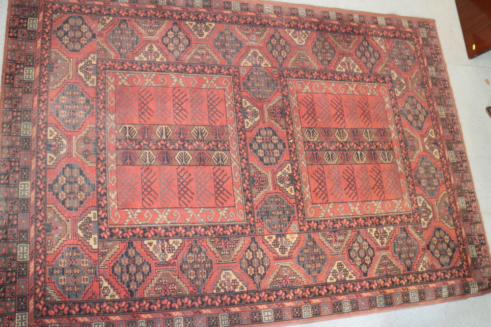 A pair of Mossoul wool pile rugs of Persian design, 55" x 80" approx