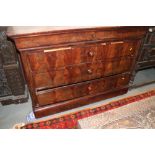A 19th century mahogany chest of three long drawers with turned handles, 50" wide