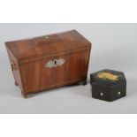 An early Victorian mahogany and brass line inlaid two-division tea caddy with ring handles, 9" wide,
