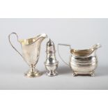 A silver cream helmet, a silver milk jug and a silver pepper shaker, 10oz troy approx