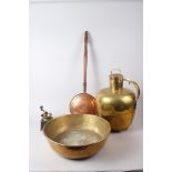 A brass and copper flagon, a brass bowl, a copper warming pan and a coffee grinder