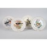 A set of four 19th century bird decorated open work dessert plates, 9" dia