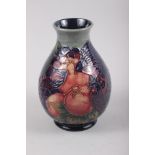 A Moorcroft "Pomegranate" pattern baluster vase, 7 1/2" high