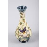 A Moorcroft Collectors Club "Sweet Thief" pattern vase, designed by Rachel Bishop, 6 1/2" high