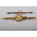 A bar brooch with diamond and pearl cluster, stamped 15ct, and a similar bar brooch, stamped 9ct (