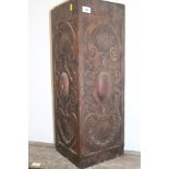 A 19th century carved oak corner-piece of Renaissance design, 28" high