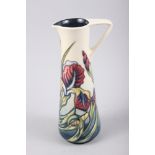 A Moorcroft "Iris" pattern ewer, 9 1/2" high