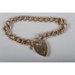A yellow metal curb link bracelet with 9ct gold heart-shaped clasp, 19.9g