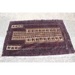 A Bokhara prayer rug on a camel ground and multi-bordered in traditional shades, 60" x 39" approx (