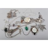 A selection of silver and white metal jewellery, including two mother-of-pearl mounted pendants