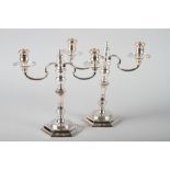 A pair of cast silver two-branch candelabra, 10 1/2" high, 42.7oz troy approx
