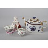 A 19th century French porcelain blue and gilt decorated teapot and cover, 4 1/4" high (knop