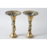 A pair of Chinese bronzed flared rim vases with relief dragon decoration and dragon stamp to base,