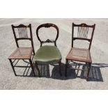 A late Victorian mahogany loop back dining chair, upholstered in a green velour, and a pair of