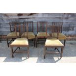 A Harlequin set of six Georgian mahogany standard dining chairs with vertical rail backs,