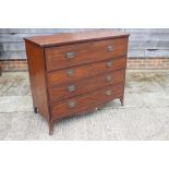 A 19th century mahogany and line inlaid secretaire chest with fitted interior over three long
