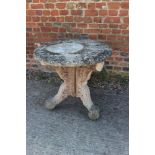 A cast stone garden table, on 'X' frame support, 26" dia x 26" high