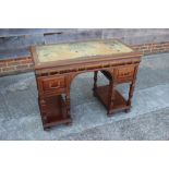 A 19th century Renaissance Revival walnut desk with tooled lined top (for restoration) over five