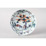 An 18th century Chinese porcelain Doucai shallow dish, decorated flora and fauna, 7 1/2" dia