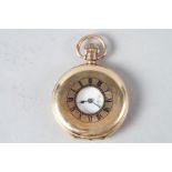 A Waltham rolled gold half hunter pocket watch with subsidiary seconds dial (cracked glass)