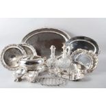 A silver plated oval tea tray, two plated entree dishes and covers, two pairs of plated salvers,