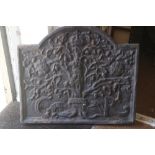 A cast iron arch top fireback of 17th century design with Boscobel oak, 34" wide x 28 1/2" high