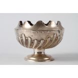 A silver bowl with shaped rim and embossed decoration, 6.6oz troy approx