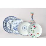 Three 19th century Chinese blue and white decorated dishes (damages), a famille rose decorated