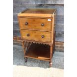 A late 19th century mahogany side cabinet with gallery over two drawers with ebony knob handles