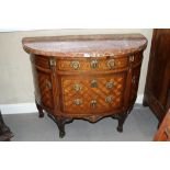 An 18th century French mahogany, kingwood, rosewood and satinwood marquetry shape front marble top