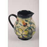 A Moorcroft "Hypericum" pattern baluster jug, 5 1/2" high